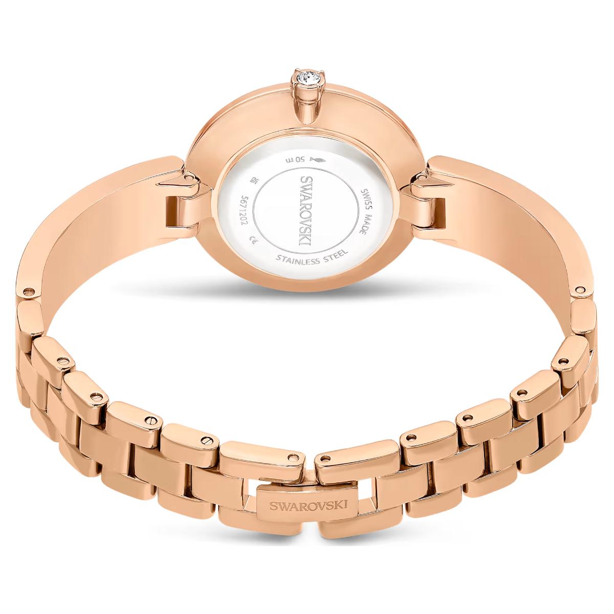Rose gold Swarovski watch on a white background