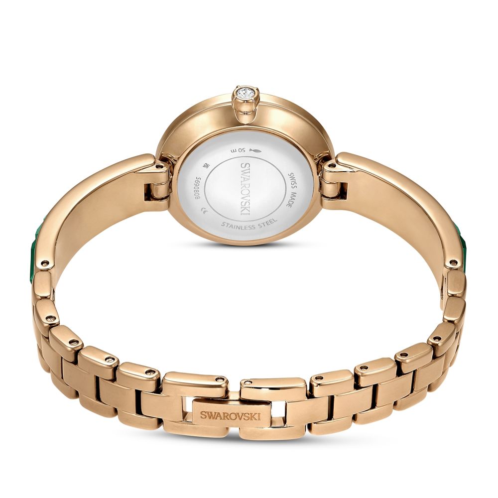 Rose gold Swarovski watch on a white background