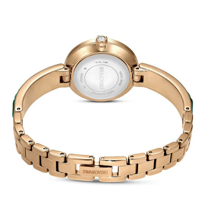 Rose gold Swarovski watch on a white background