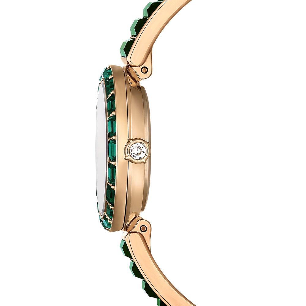 Rose gold watch with green gemstones on a white background