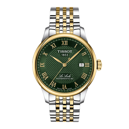 Tissot watch with green dial and two-tone metal bracelet on a white background