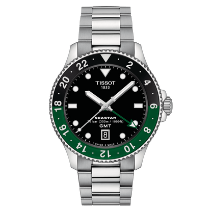 A Tissot Seastar 1000 Quartz GMT watch with a black dial, stainless steel case, and a silver strap. The watch has a digital display and a date function.