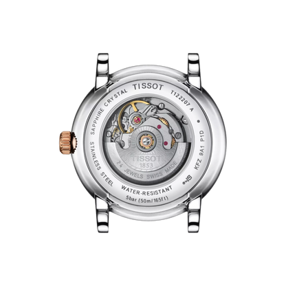 Tissot watch mechanism on a white background