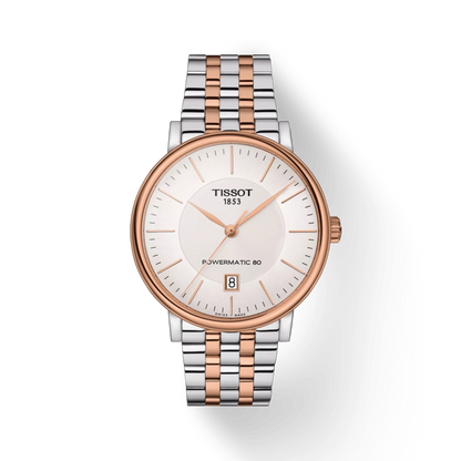 Tissot watch with two-tone metal strap on a white background