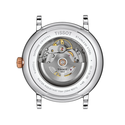 Tissot watch face with mechanical components on a white background