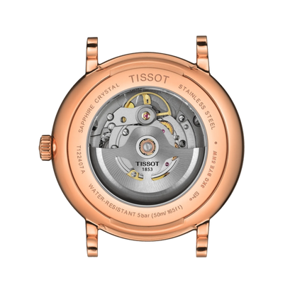 Rose gold Tissot watch with mechanical movement on a white background