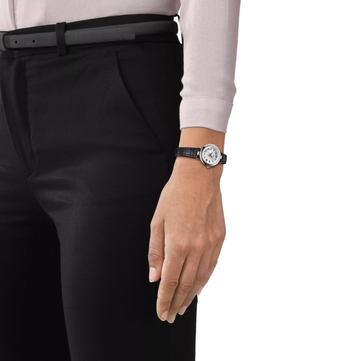 Person wearing a black watch on a white background