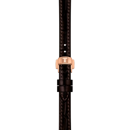 Brown leather strap with a rose gold clasp on a white background
