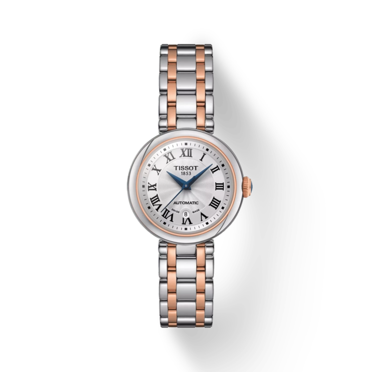 Tissot watch with silver and rose gold band on a white background