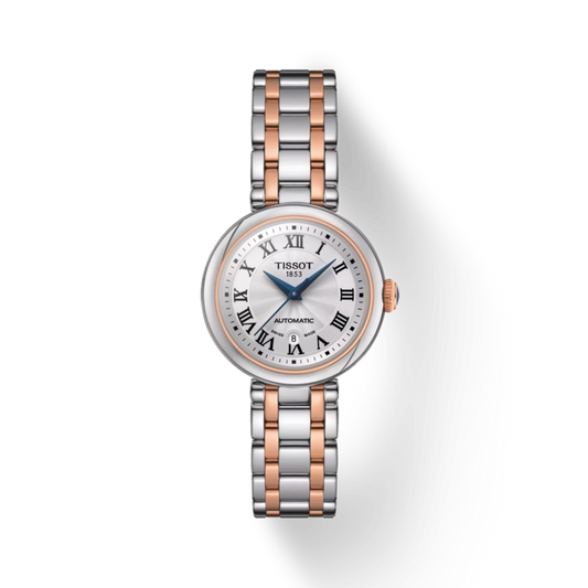 Tissot watch with silver and rose gold band on a white background