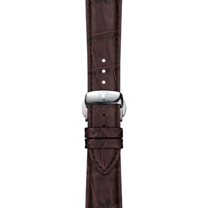 Brown crocodile leather watch strap with silver buckle on a white background