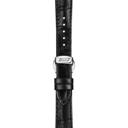 Black crocodile-patterned watch strap with Tissot logo on a white background