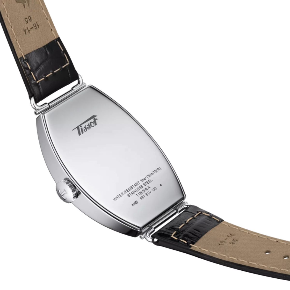 Close-up of a watch with a brown leather strap and silver case on a white background