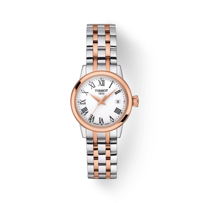 Tissot watch with two-tone rose gold and silver bracelet on a white background