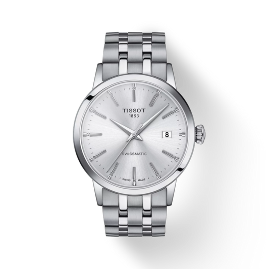 Silver Tissot watch with a white face on a light gray background