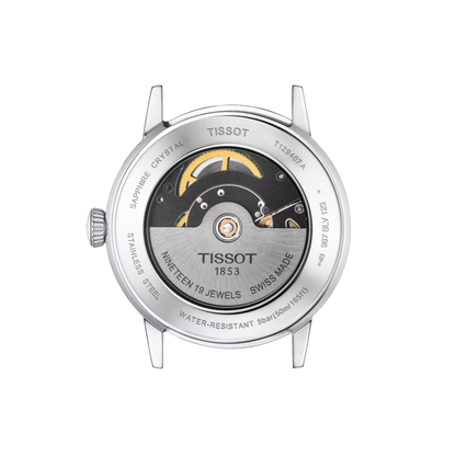 Tissot watch face with detailed mechanical components on a white background