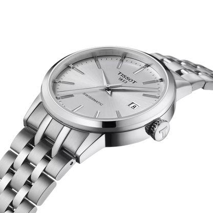 Silver Tissot watch with a white dial on a white background