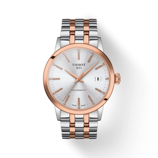 Tissot watch with two-tone rose gold and silver bracelet on a white background