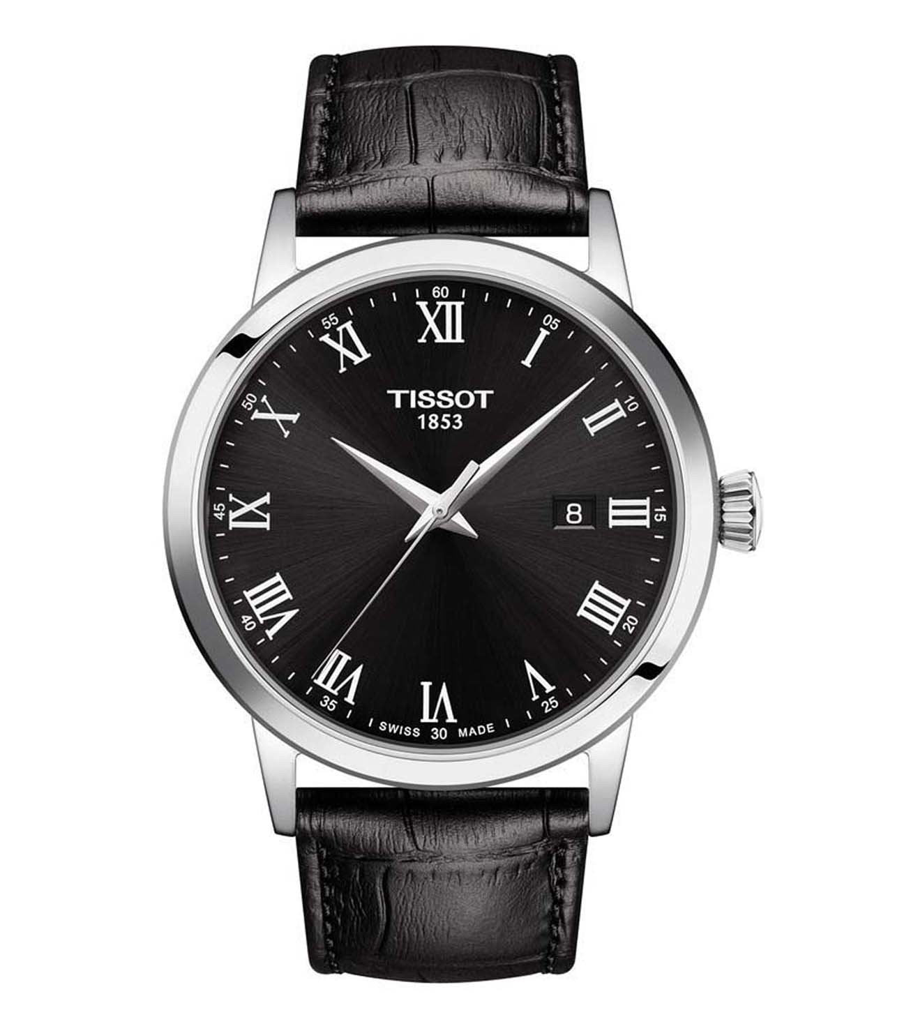 A TISSOT CLASSIC DREAM men's analog watch with a black dial, silver case, and black leather strap.