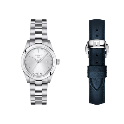 Tissot watch with silver metal strap and black leather strap on a white background
