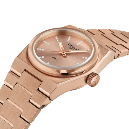 Rose gold Tissot watch on a white background