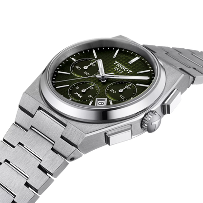 Silver Tissot watch with a dark green face on a white background