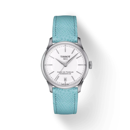 Tissot watch with turquoise strap on a white background