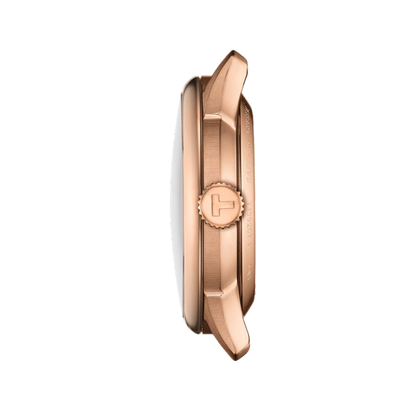 Rose gold watch case on a white background
