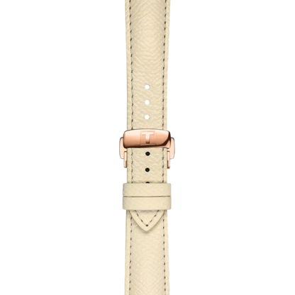 Beige watch strap with rose gold buckle on a white background