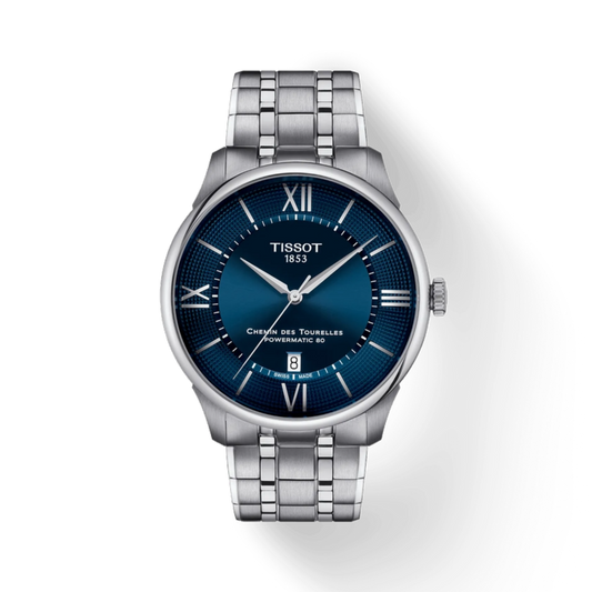 Tissot watch with blue dial and silver metal bracelet on a white background