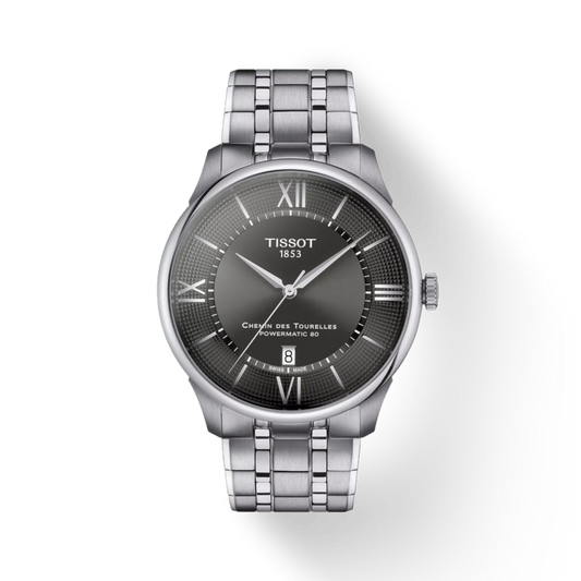 Tissot watch with silver bracelet and dark face on a white background
