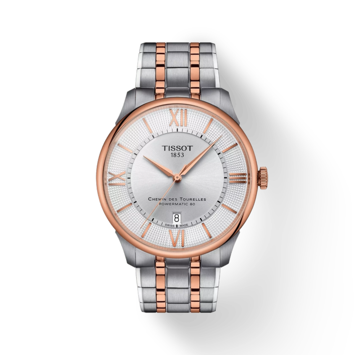 Tissot watch with silver and rose gold band on a white background