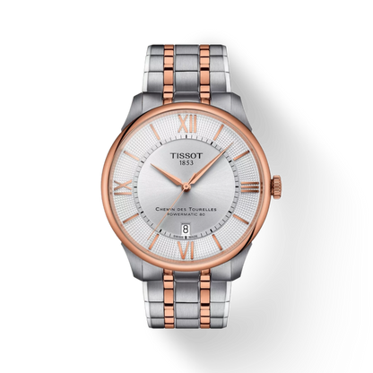 Tissot watch with silver and rose gold band on a white background