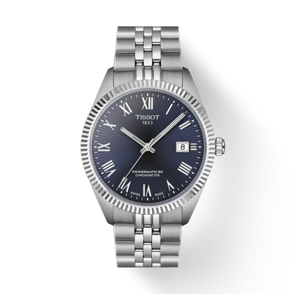 Silver Tissot watch with blue dial on a white background