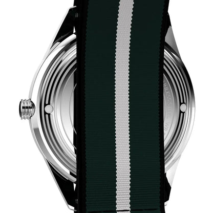 Close-up of a watch with a black strap featuring a white stripe on a white background