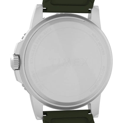 Watch with a green strap and silver case on a white background