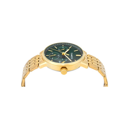 Gold watch with a green dial on a white background