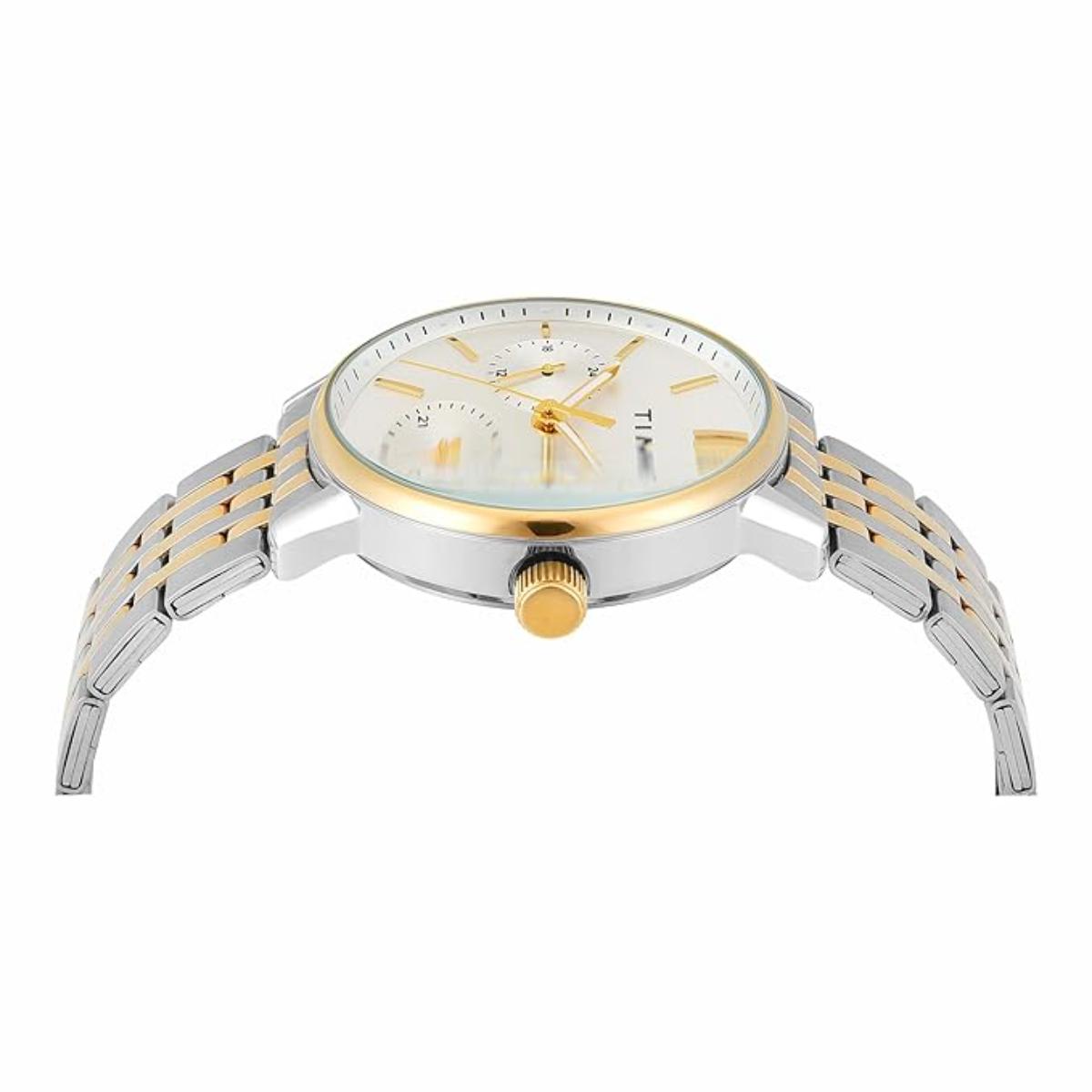Two-tone watch with silver and gold straps on a white background