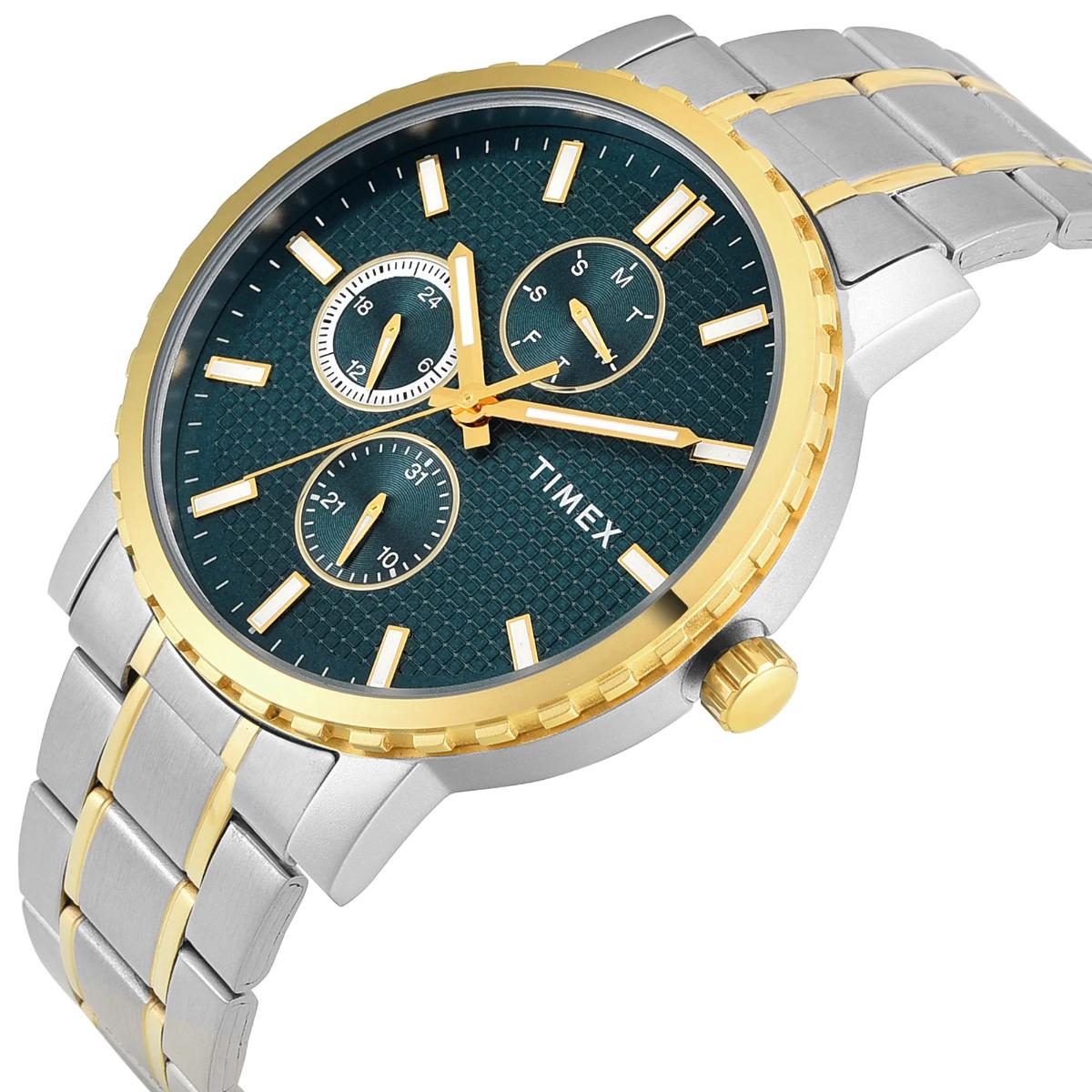 Timex watch with silver and gold band on a white background