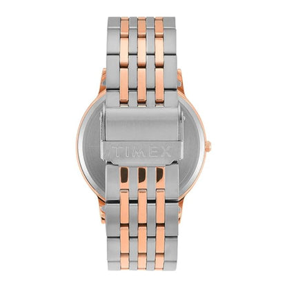 Timex watch with rose gold and silver metal band on a white background