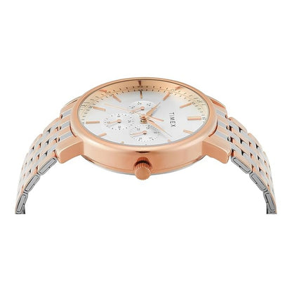 Rose gold and silver watch on a white background