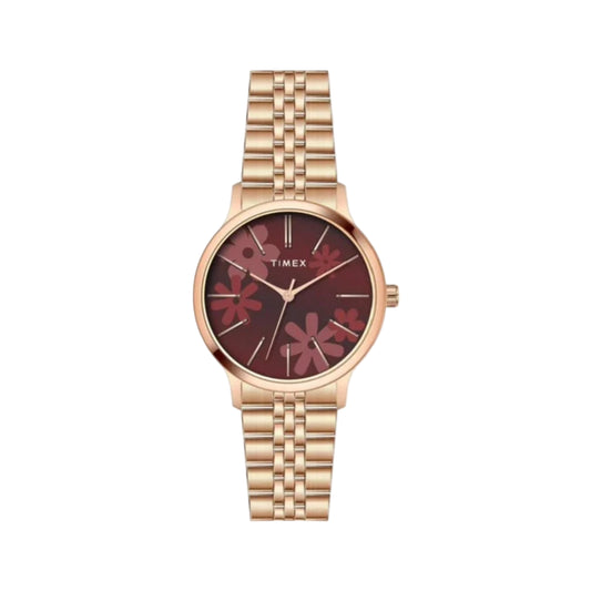 GoldTimex watch with floral design on a light gray background