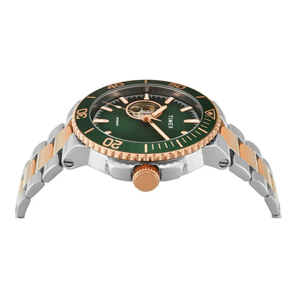 Timex watch with green face and rose gold accents on a white background