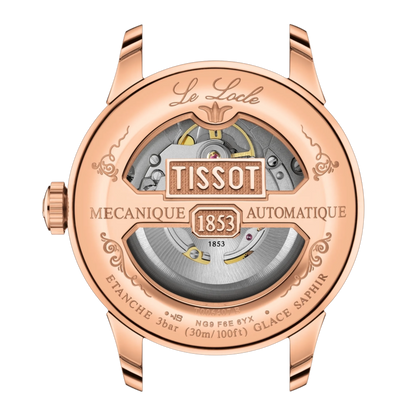 Rose gold Tissot watch with visible brand name on a white background