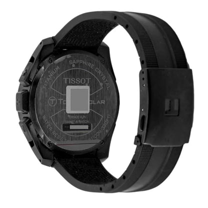 Black Tissot watch back view on a white background