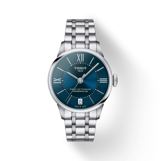 Tissot watch with blue dial and silver bracelet on a white background