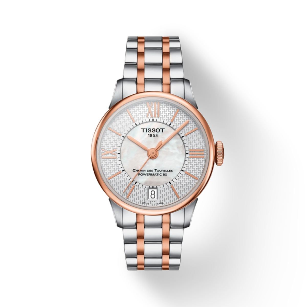 Tissot watch with silver and rose gold band on a white background