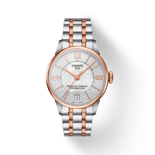 Tissot watch with silver and rose gold band on a white background