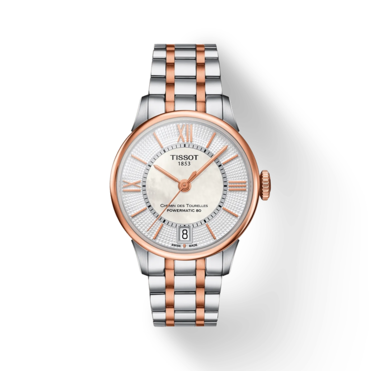 Tissot watch with silver and rose gold band on a white background