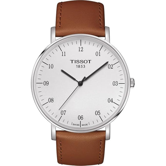 A Tissot T-Classic Everytime Swiss Quartz men's watch with a white dial and brown leather strap.